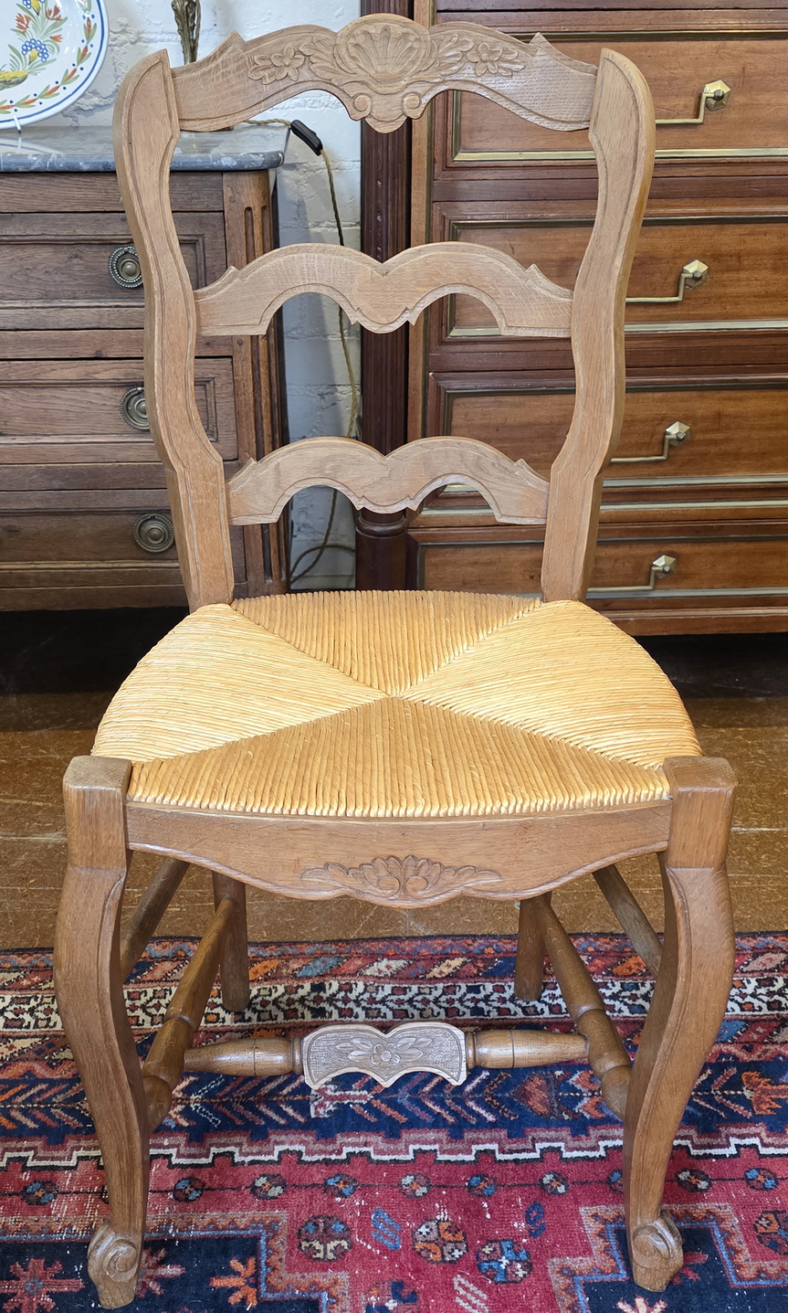 A set of 4 French Provincial Ladderback Chairs